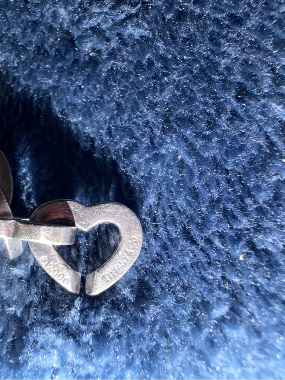 Tiffany & Co. Silver Heart Link Charm on Blue